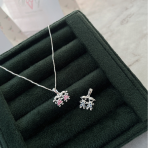 Dije  2 nenas en plata 925 con circonias rosas