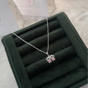 Dije  2 nenas en plata 925 con circonias rosas